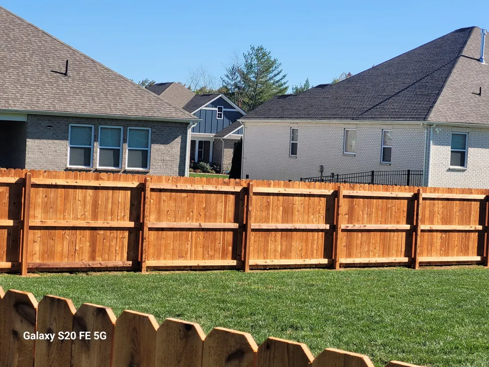 Stained wood privacy fence built by RB Fence